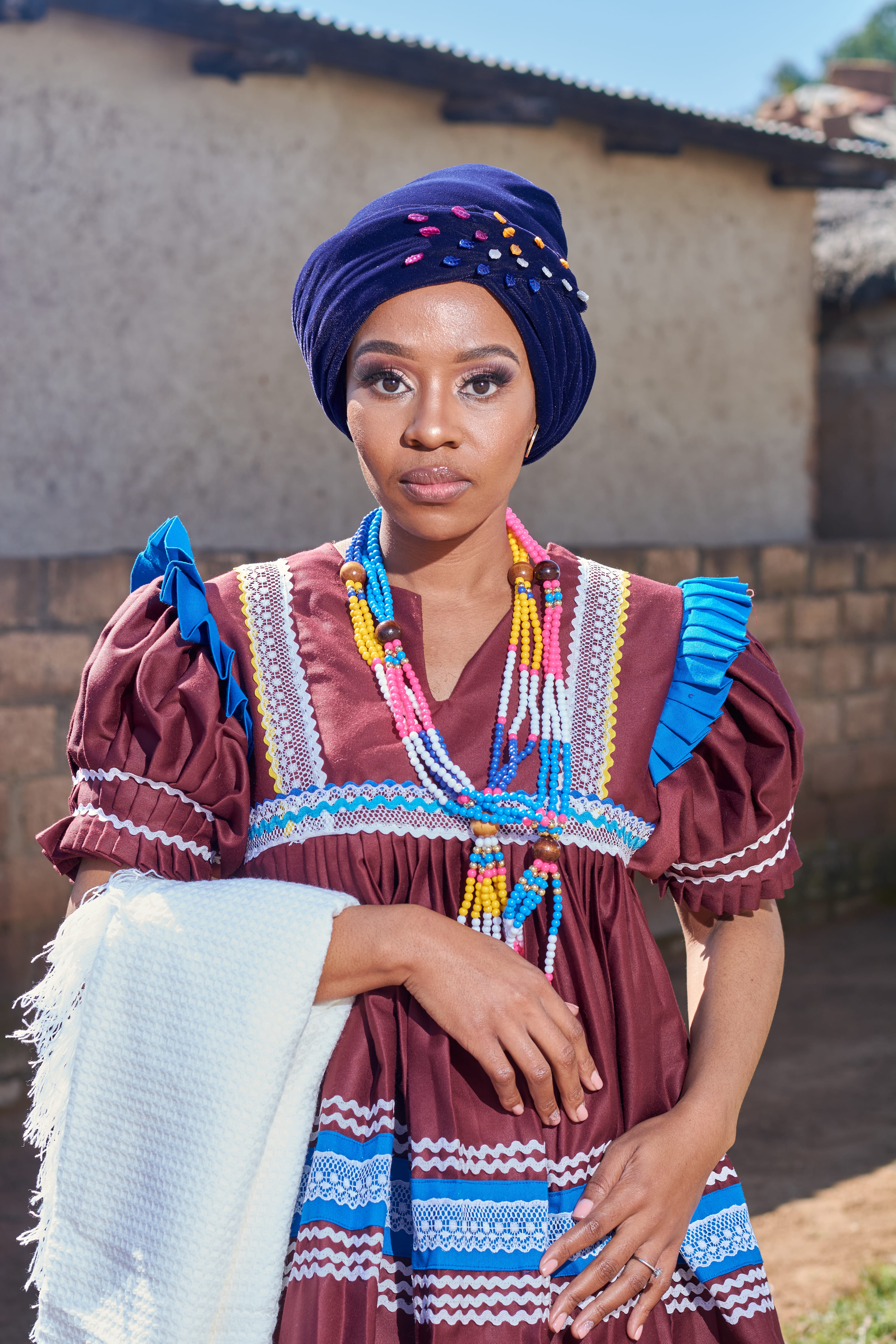 Bride and groom embracing during traditional wedding